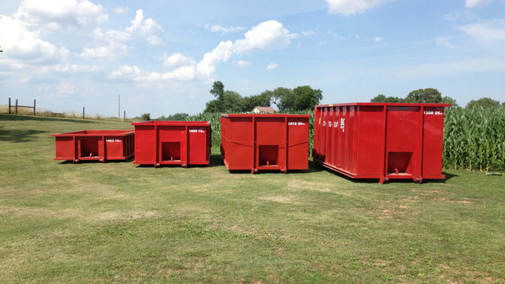 A Picture Of Four Different Red Dumpsters In All Different Sizes Available From Dumpster Rent Omaha